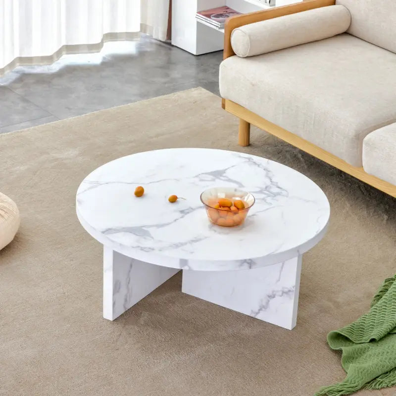 This round coffee table is suitable for small spaces and living rooms.