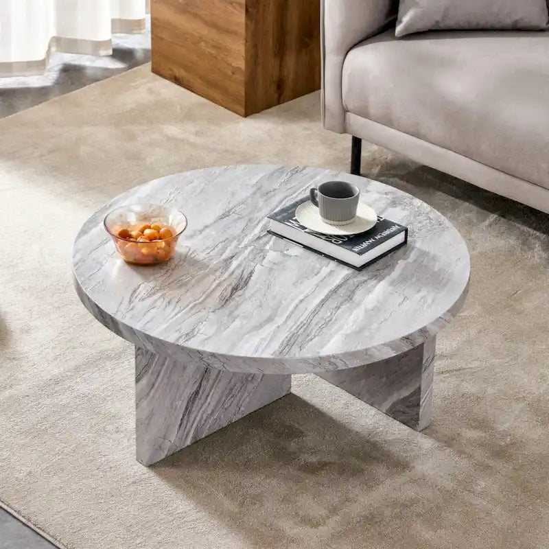 This round coffee table is suitable for small spaces and living rooms.
