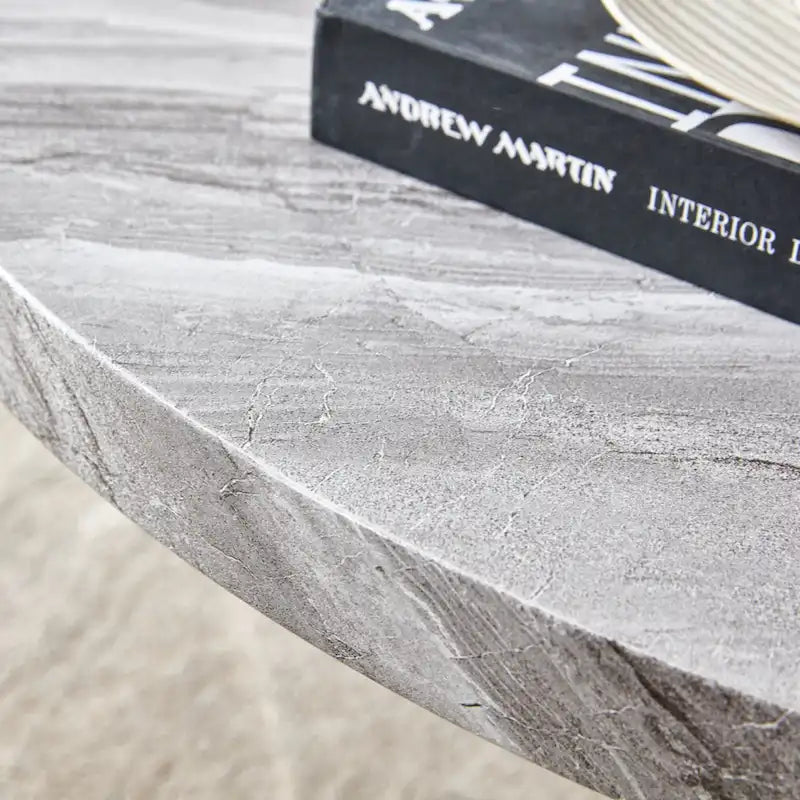 This round coffee table is suitable for small spaces and living rooms.